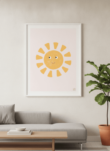 Modern wall art styled above a sofa in a neutral living room