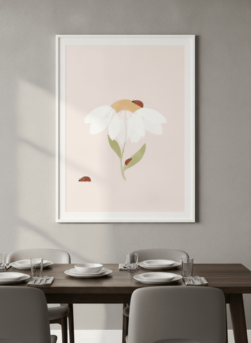 Wall art styled above a dining table in a contemporary home