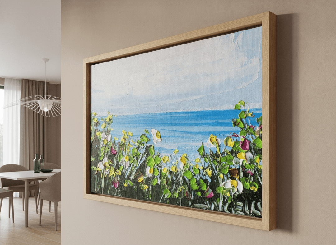 Wall art styled above a dining table in a contemporary home