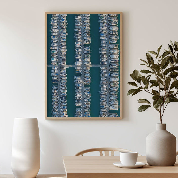 Modern living room with abstract art, table, chairs, and plant