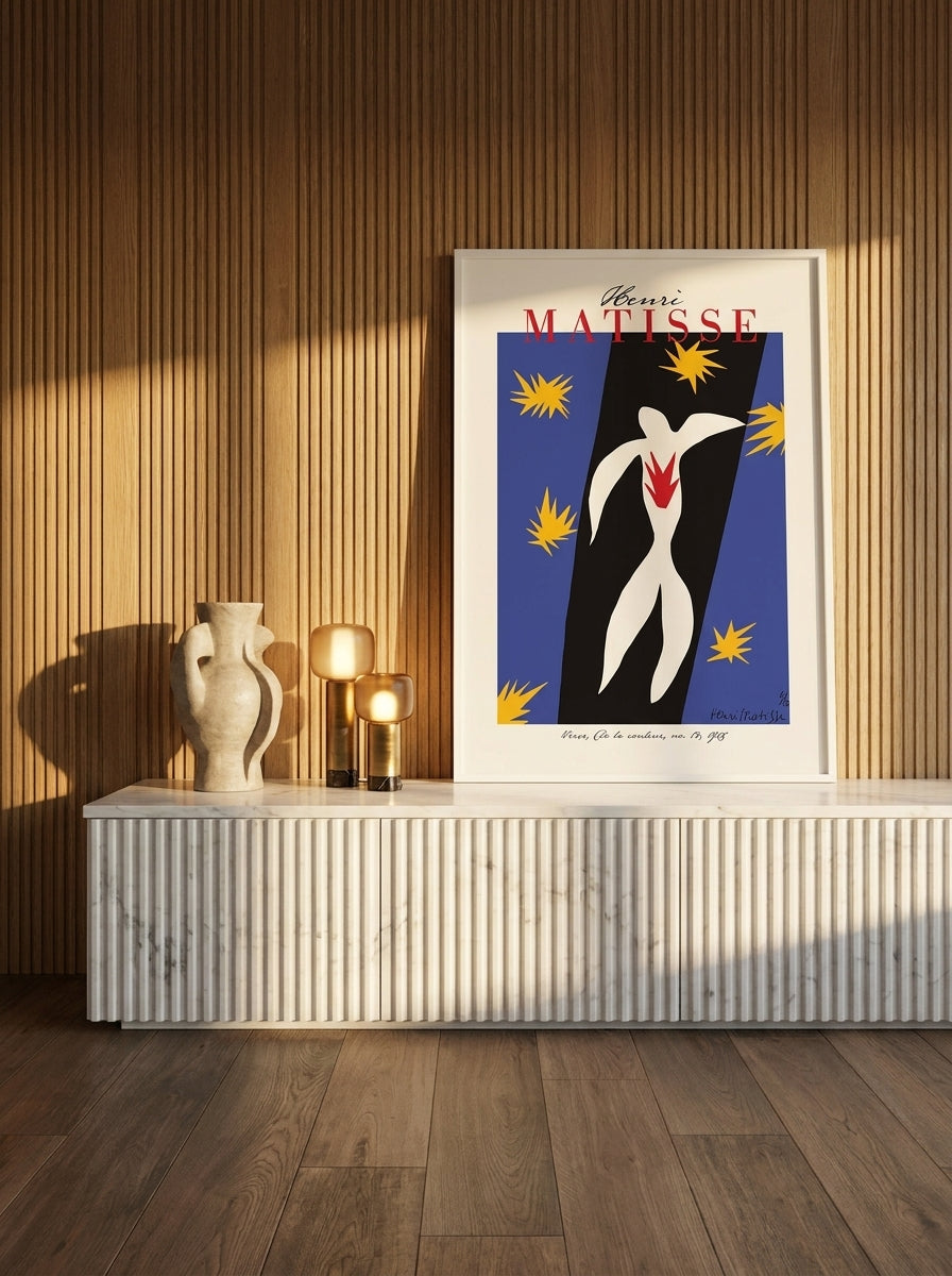 Modern wall art print standing on a sideboard in a luxe bedroom