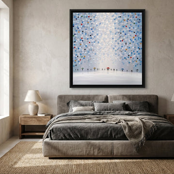 Canvas wall art with a black surround styled in a calm, light-filled bedroom
