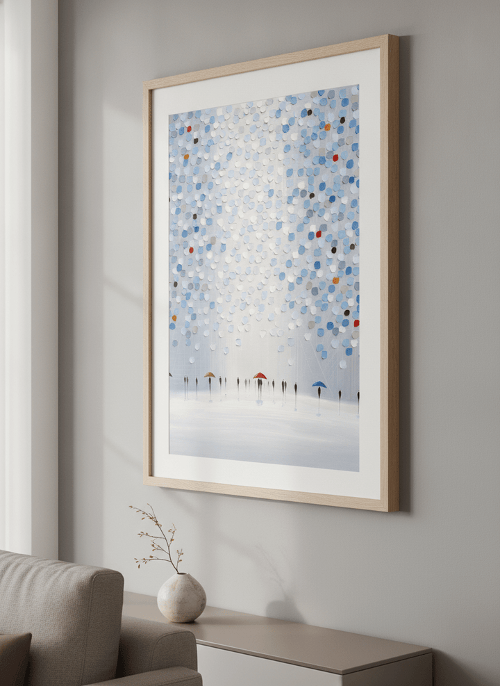 Modern wall art styled above a sofa in a neutral living room