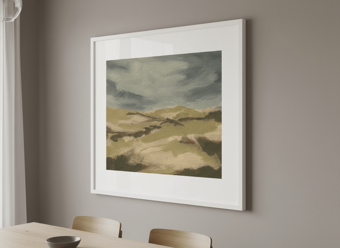 Wall art styled above a dining table in a contemporary home