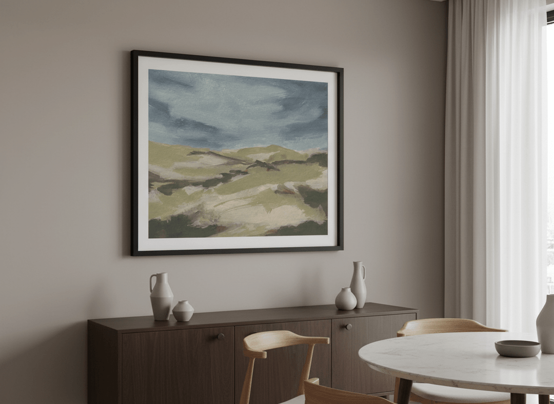 Wall art styled above a dining table in a contemporary home
