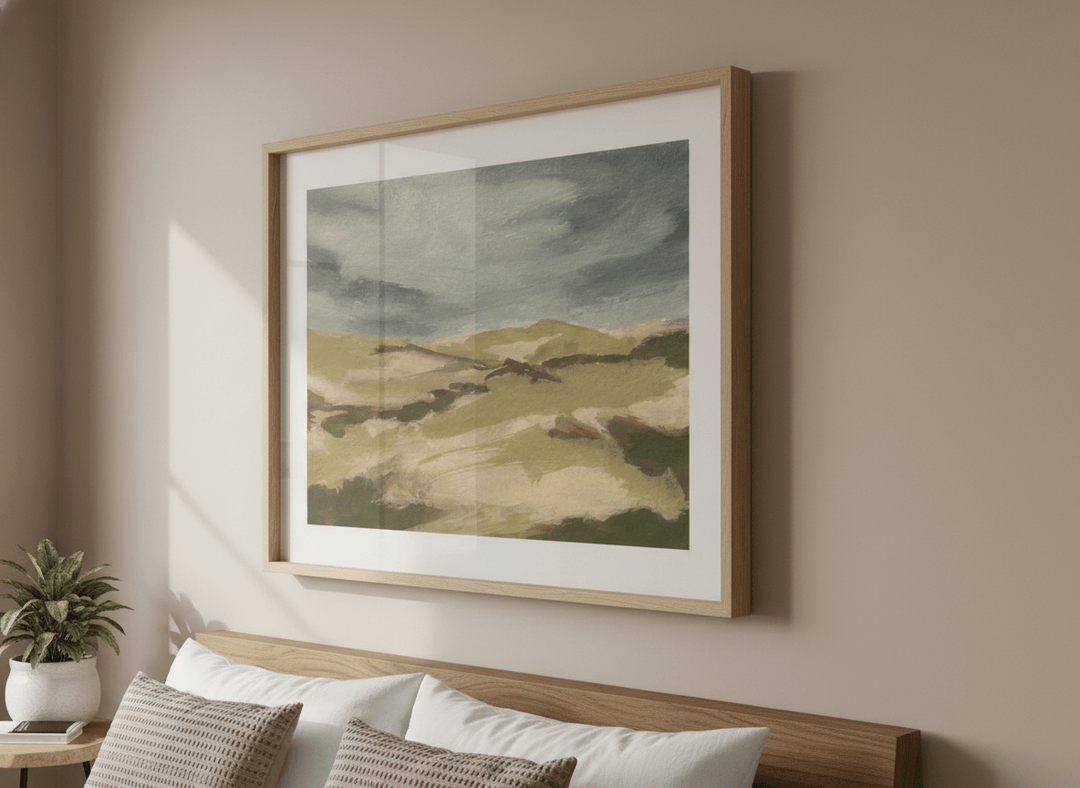 Minimalist artwork displayed in a calm, light-filled bedroom interior