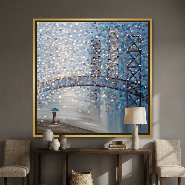 Canvas wall art with a gold leaf surround styled in a contemporary dining room