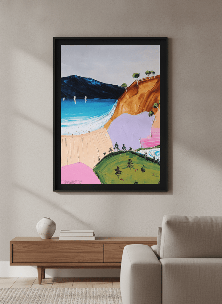 Modern wall art styled above a sofa in a neutral living room