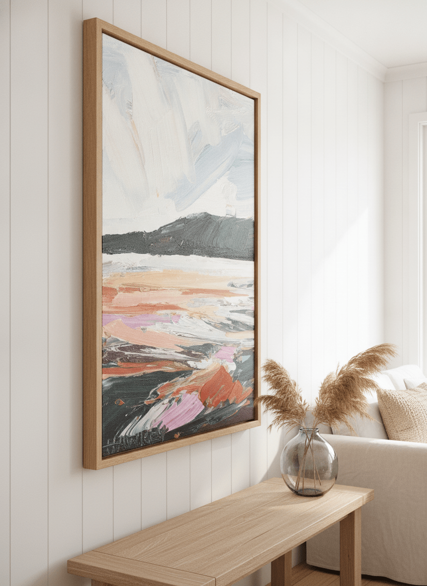 Neutral wall art displayed in a sunny coastal beach house