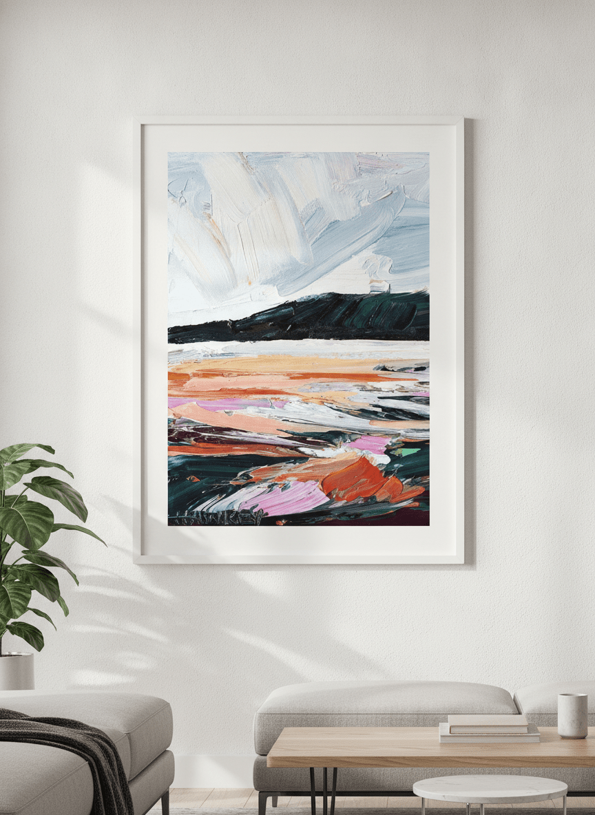 Modern wall art styled above a sofa in a neutral living room