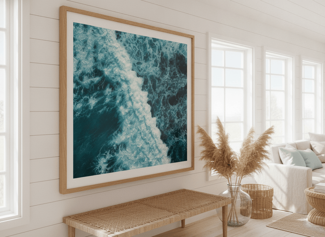 Neutral wall art displayed in a sunny coastal beach house