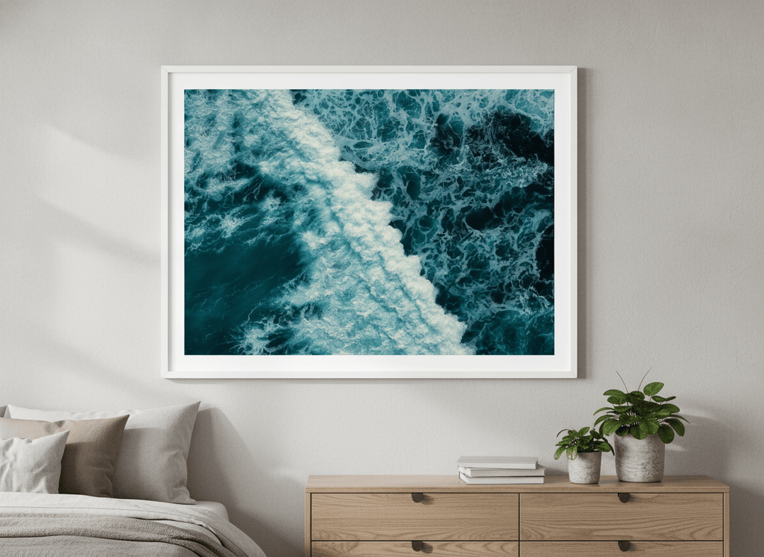 Minimalist artwork displayed in a calm, light-filled bedroom interior