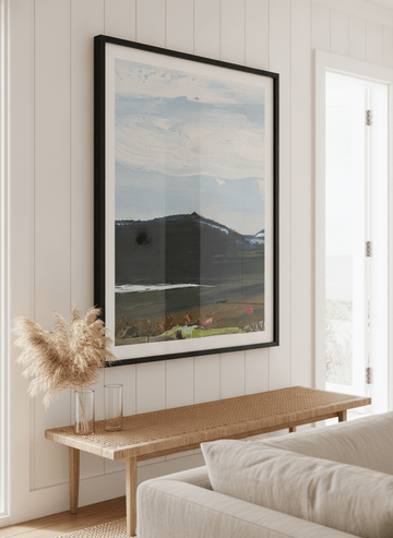 Neutral wall art displayed in a sunny coastal beach house