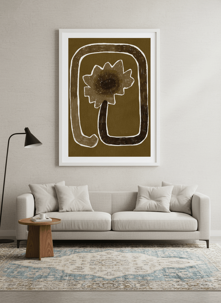 Modern wall art styled above a sofa in a neutral living room