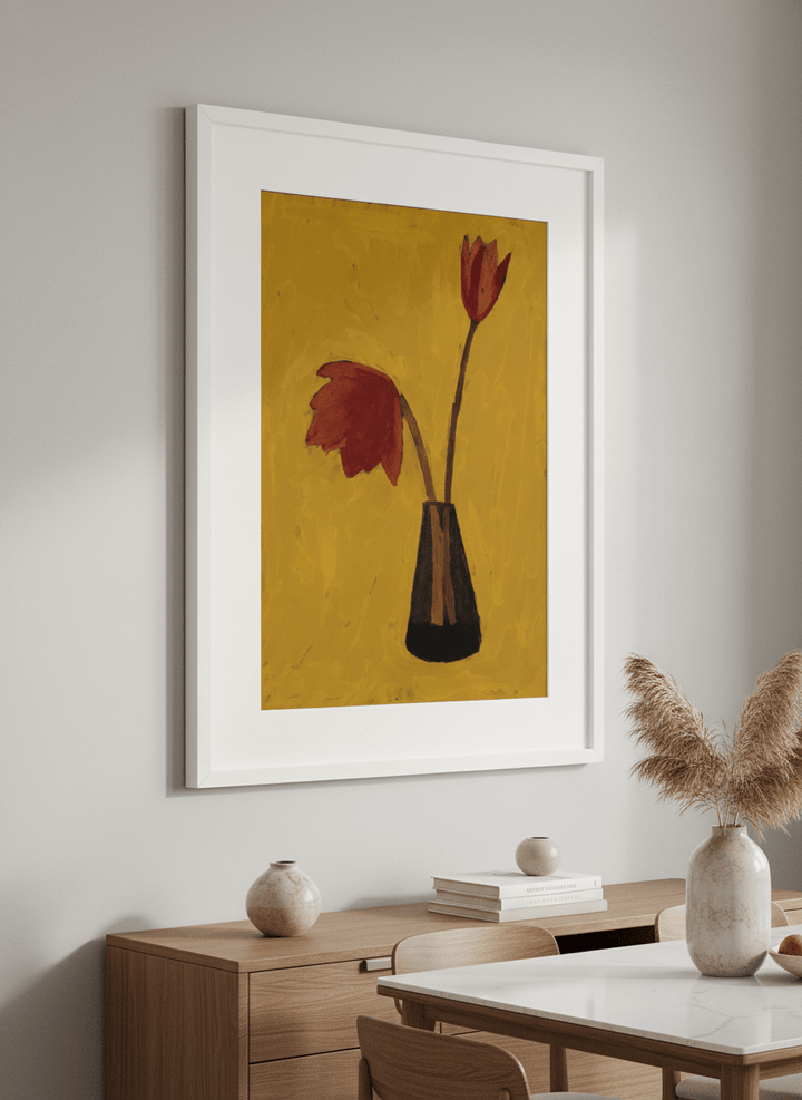 Wall art styled above a dining table in a contemporary home