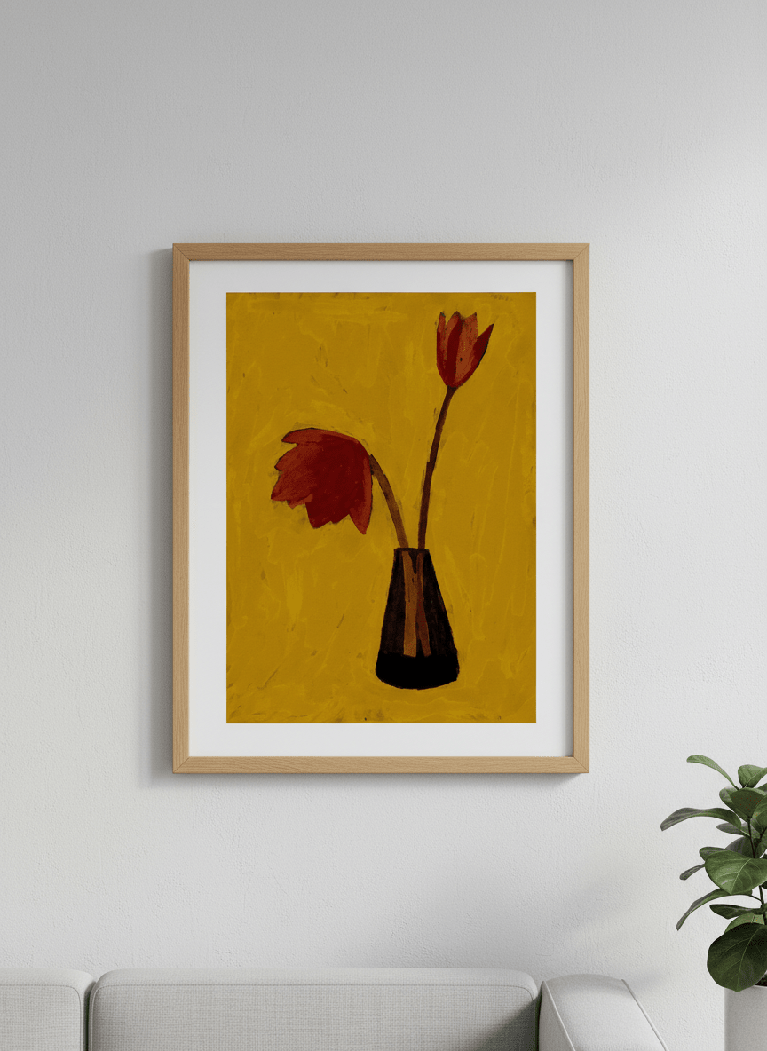 Modern wall art styled above a sofa in a neutral living room