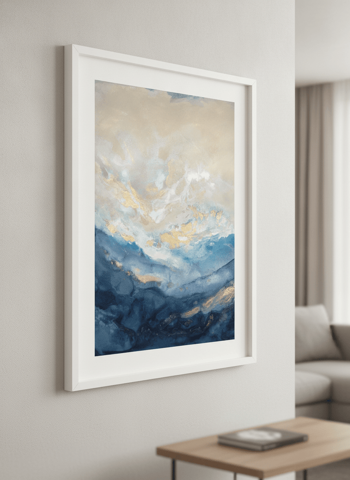 Modern wall art styled above a sofa in a neutral living room