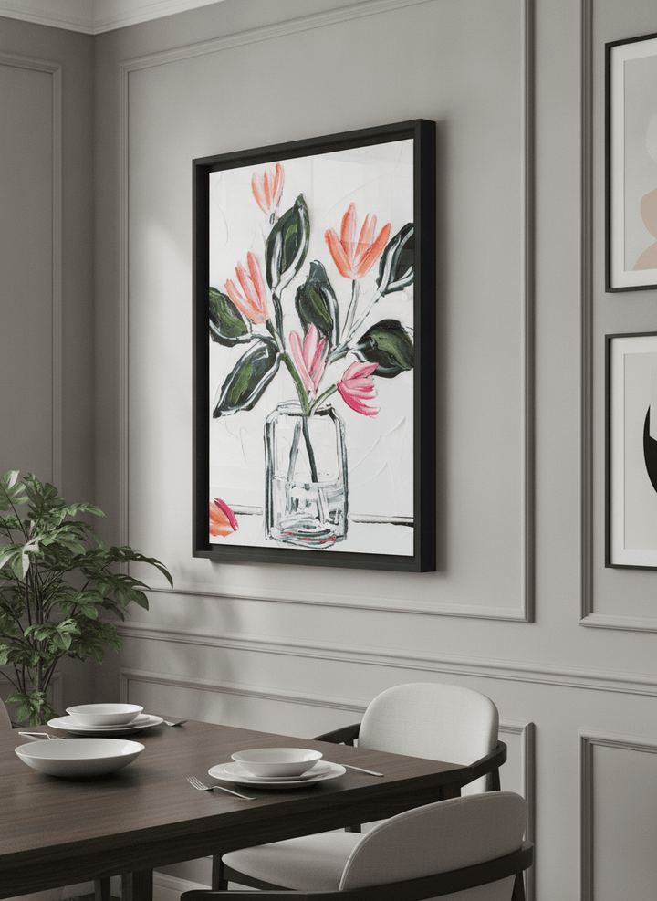 Wall art styled above a dining table in a contemporary home