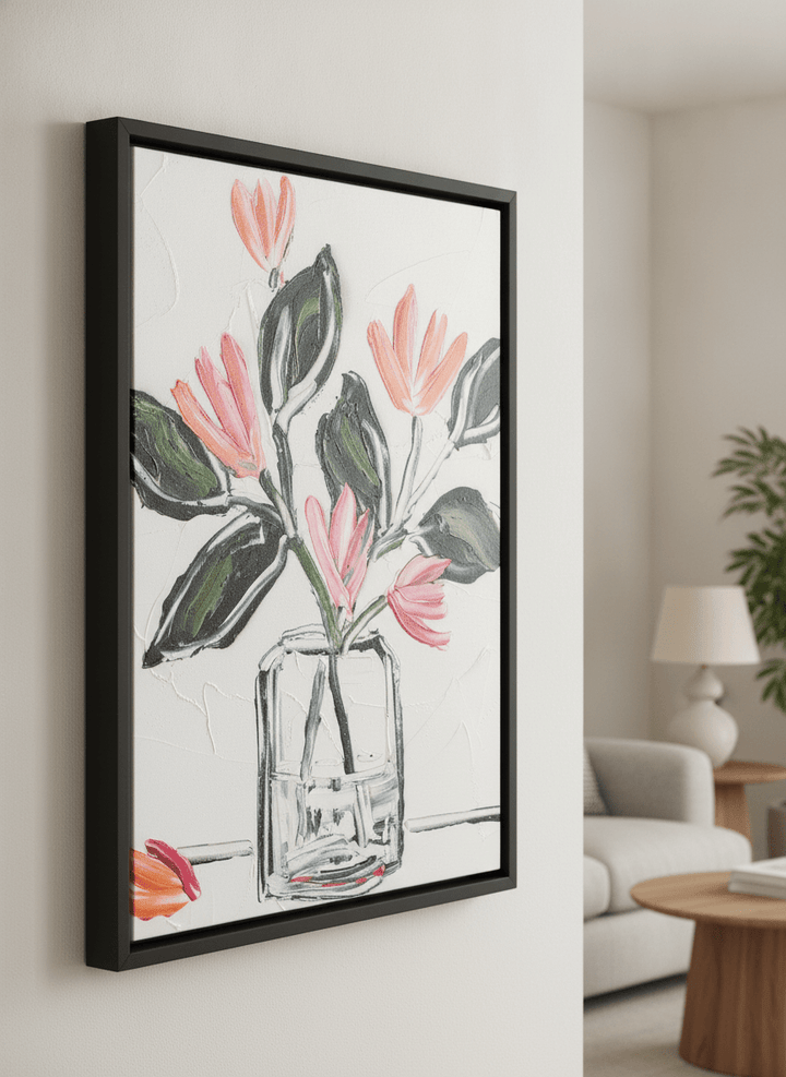 Modern wall art styled above a sofa in a neutral living room