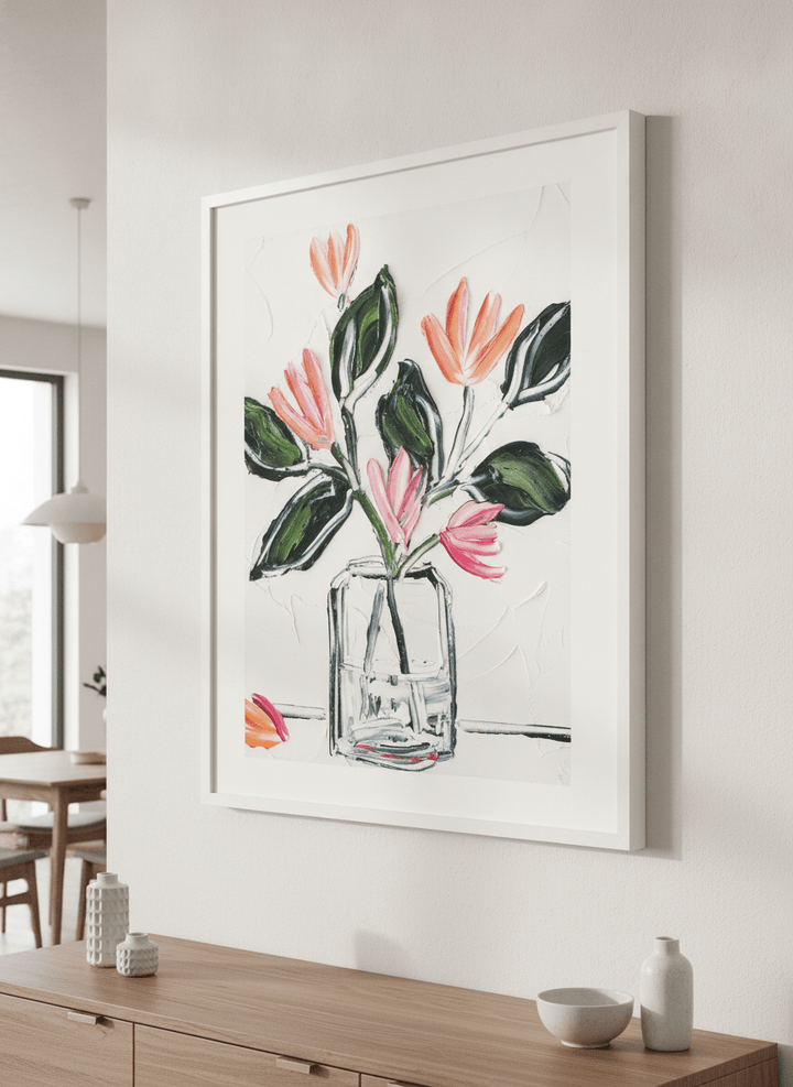 Wall art styled above a dining table in a contemporary home