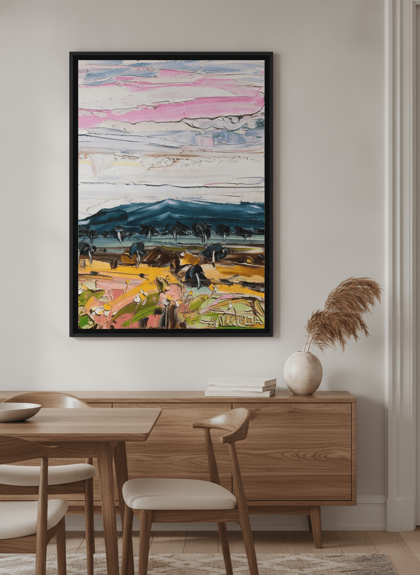 Wall art styled above a dining table in a contemporary home