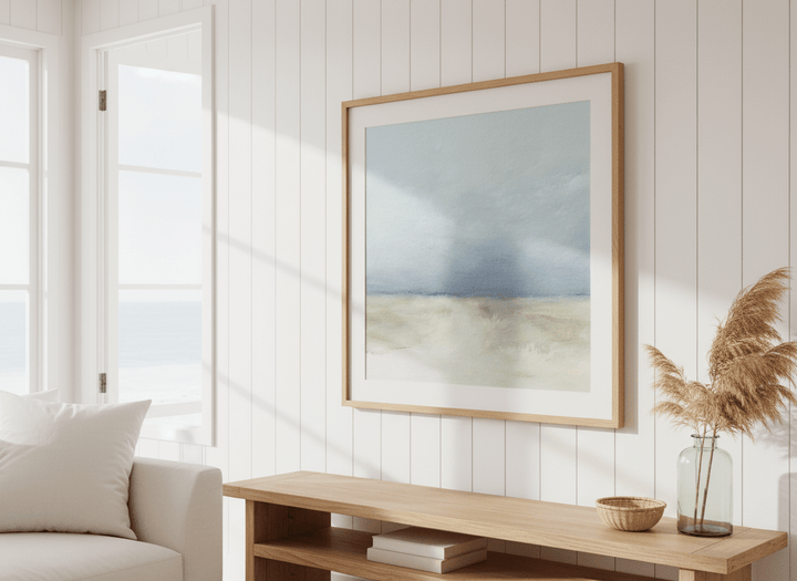 Neutral wall art displayed in a sunny coastal beach house
