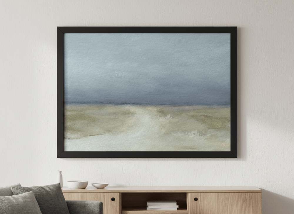 Modern wall art styled above a sofa in a neutral living room