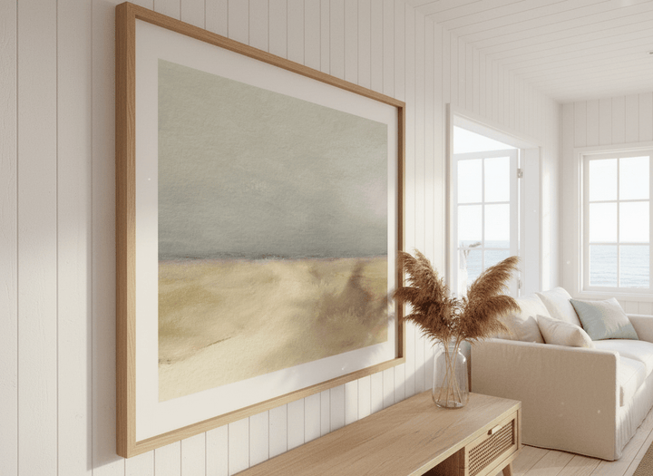 Neutral wall art displayed in a sunny coastal beach house