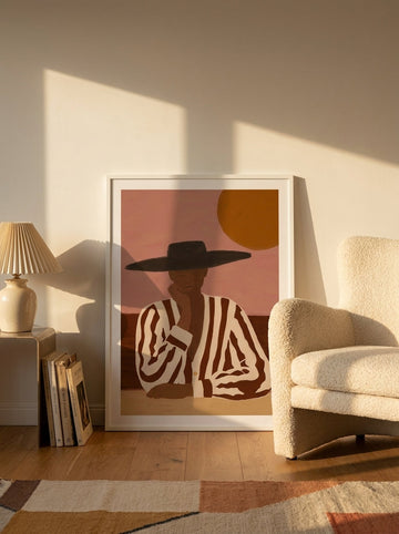 Modern wall art print leaning against the wall in a mid-century bedroom
