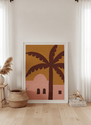 Oversized statement modern wall art print leaning against the wall in a coastal bedroom