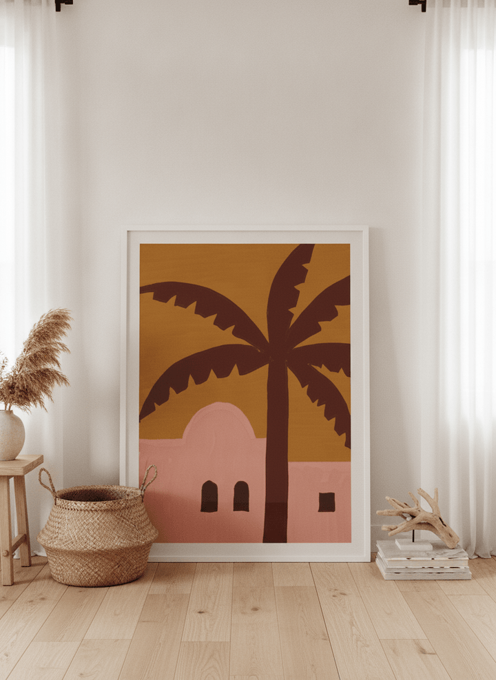 Oversized statement modern wall art print leaning against the wall in a coastal bedroom