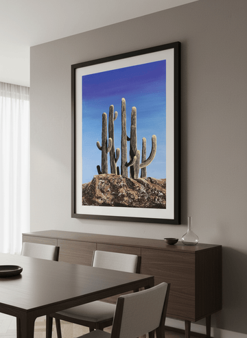 Wall art styled above a dining table in a contemporary home