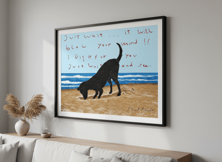 Modern wall art styled above a sofa in a neutral living room