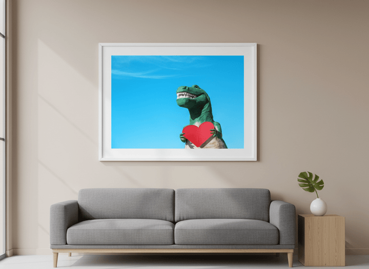 Modern wall art styled above a sofa in a neutral living room