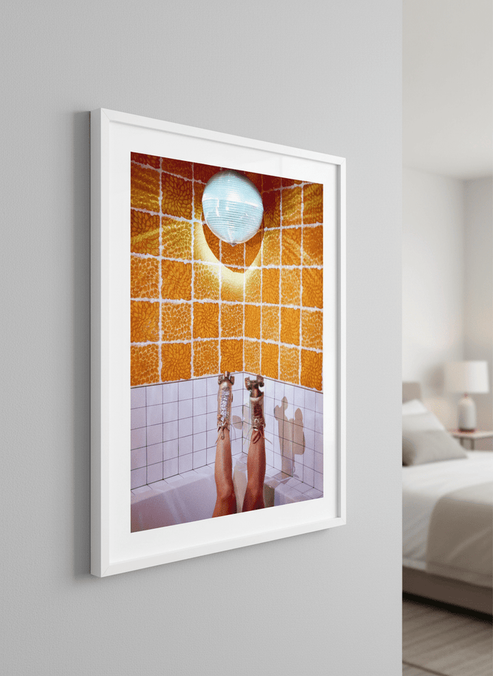 Minimalist artwork displayed in a calm, light-filled bedroom interior