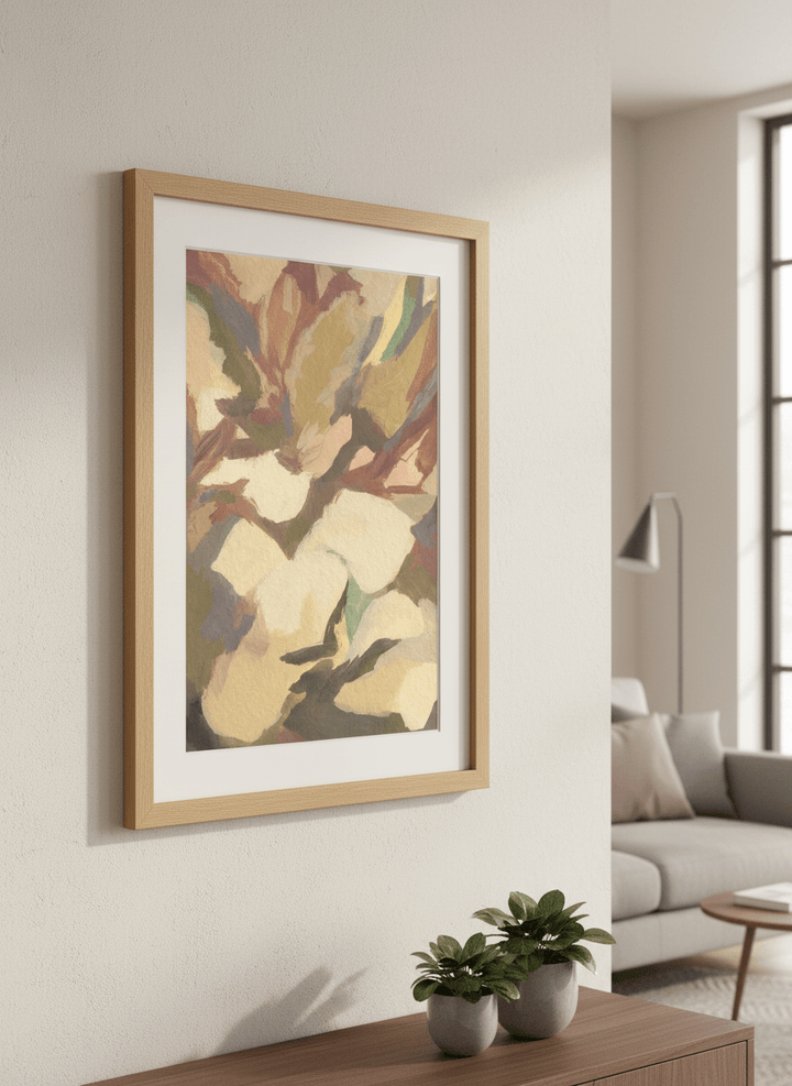 Modern wall art styled above a sofa in a neutral living room