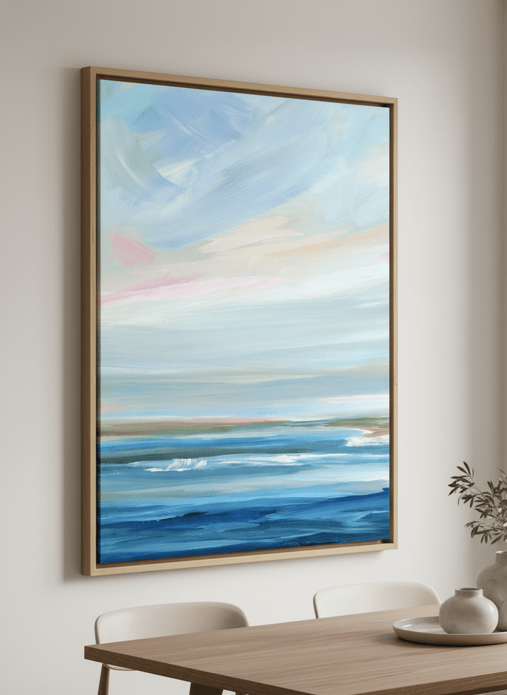 Wall art styled above a dining table in a contemporary home