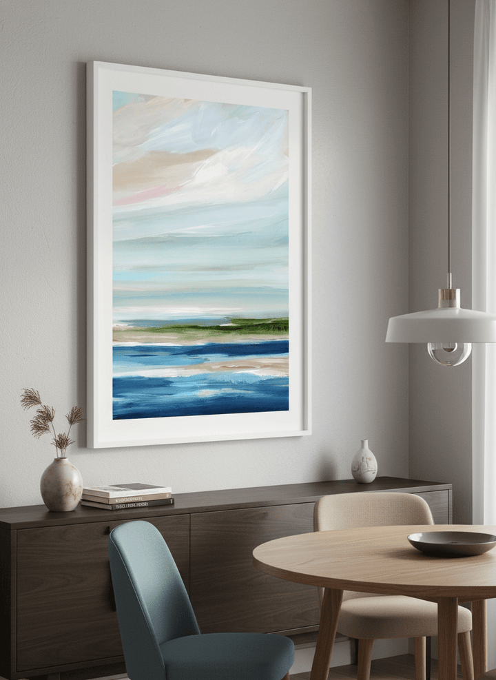 Wall art styled above a dining table in a contemporary home
