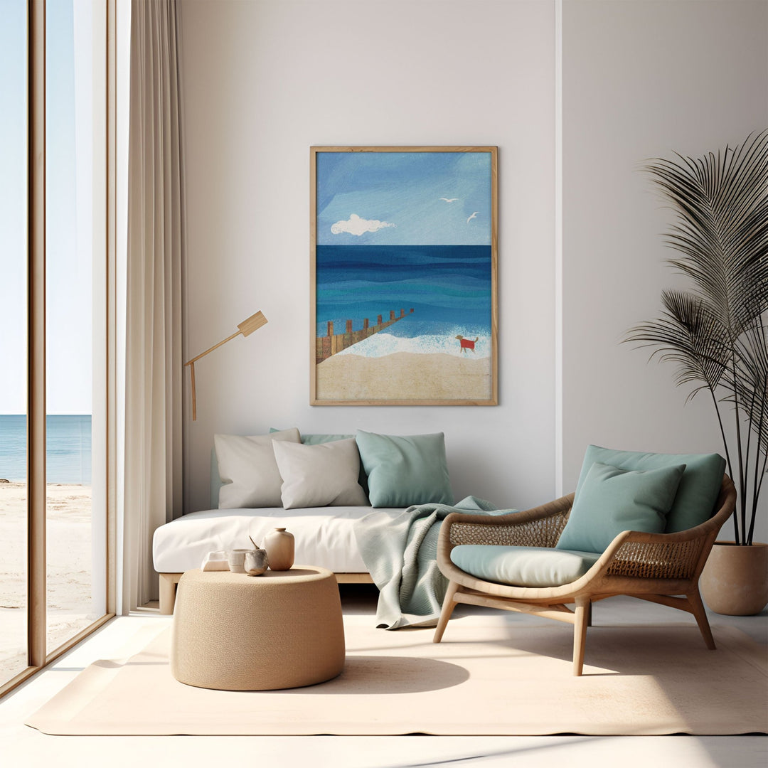 Modern living room with beach-themed decor, including a sofa, armchair, and an artwork of a beach scene.