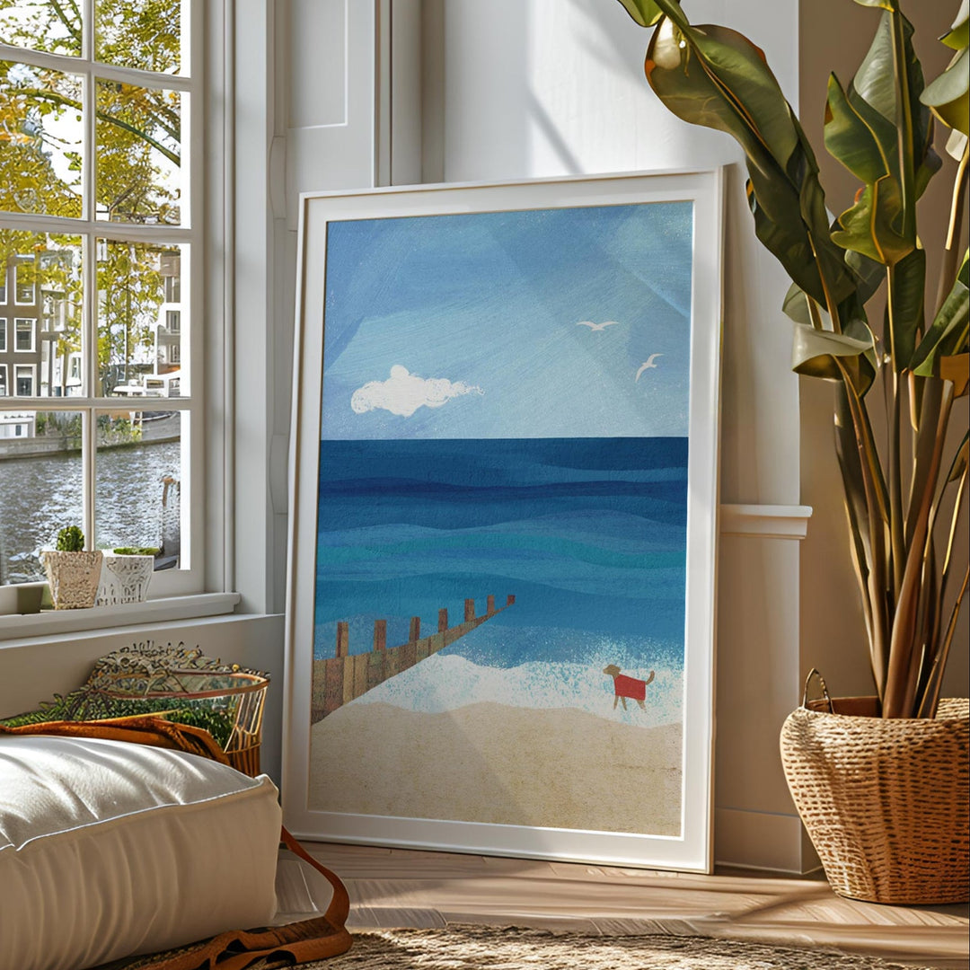 Living room with a large window, sofa, and beach painting.