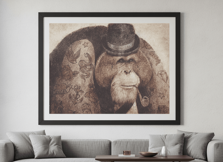 Modern wall art styled above a sofa in a neutral living room