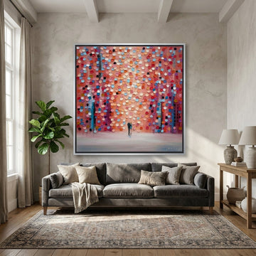 Oversized statement canvas wall art with a silver leaf surround styled in a neutral living room