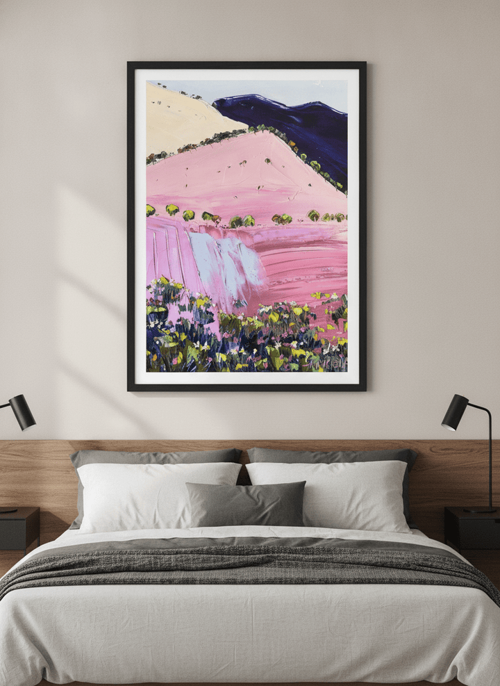 Minimalist artwork displayed in a calm, light-filled bedroom interior