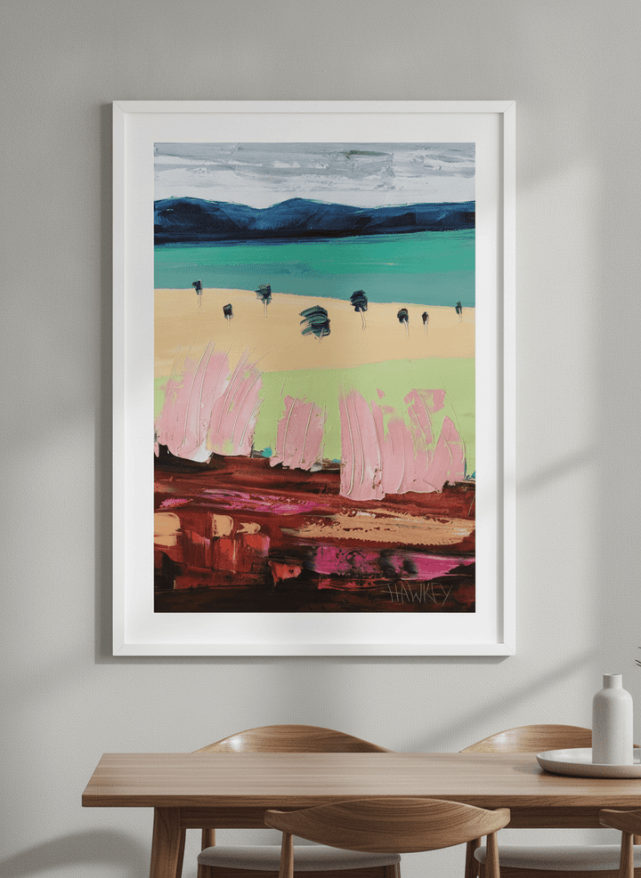 Wall art styled above a dining table in a contemporary home