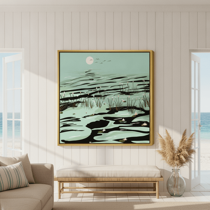 Oversized statement canvas wall art with a gold leaf surround styled in a sunny coastal beach house
