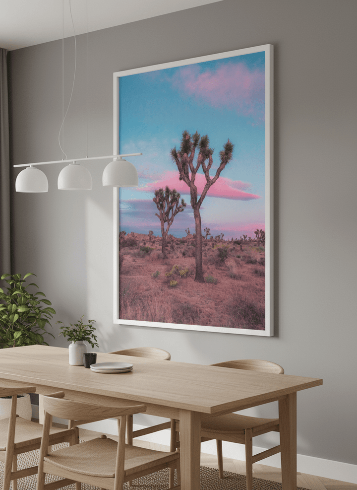 Wall art styled above a dining table in a contemporary home