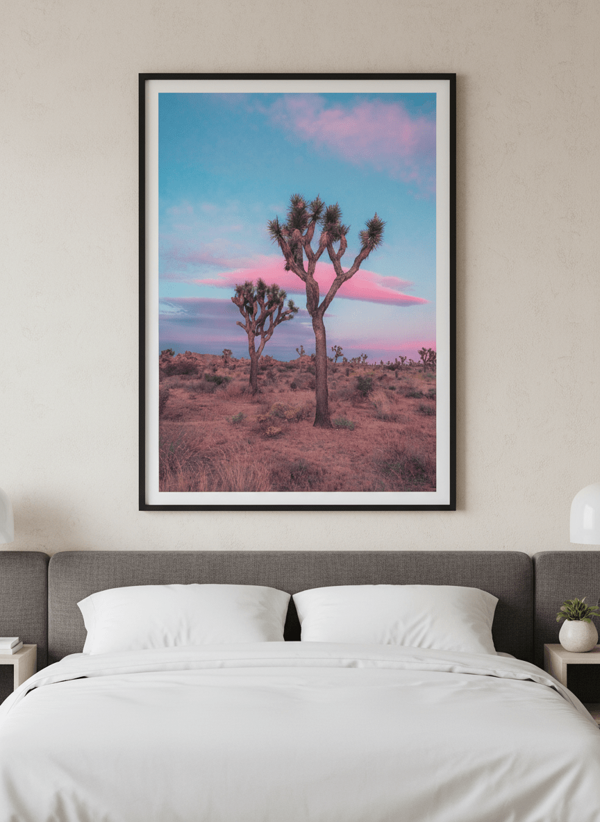 Minimalist artwork displayed in a calm, light-filled bedroom interior