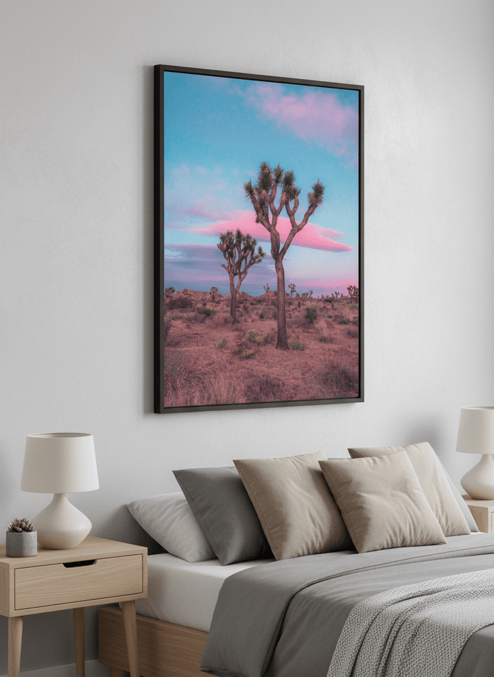 Minimalist artwork displayed in a calm, light-filled bedroom interior