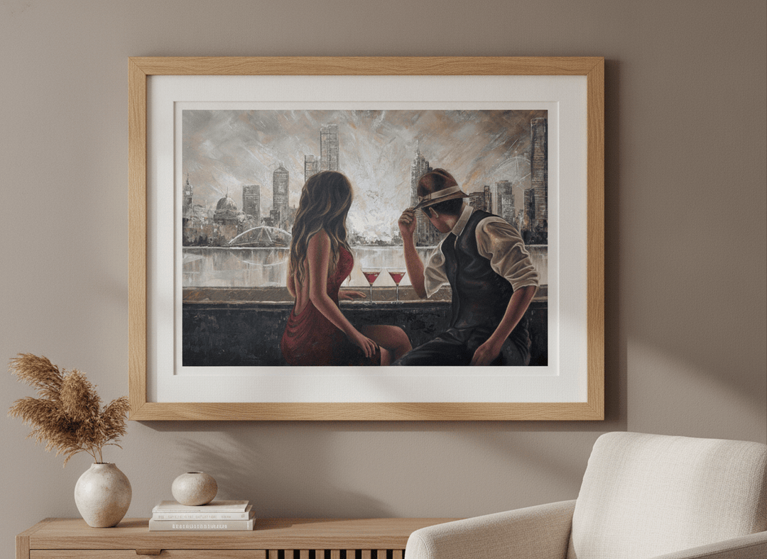 Modern wall art styled above a sofa in a neutral living room