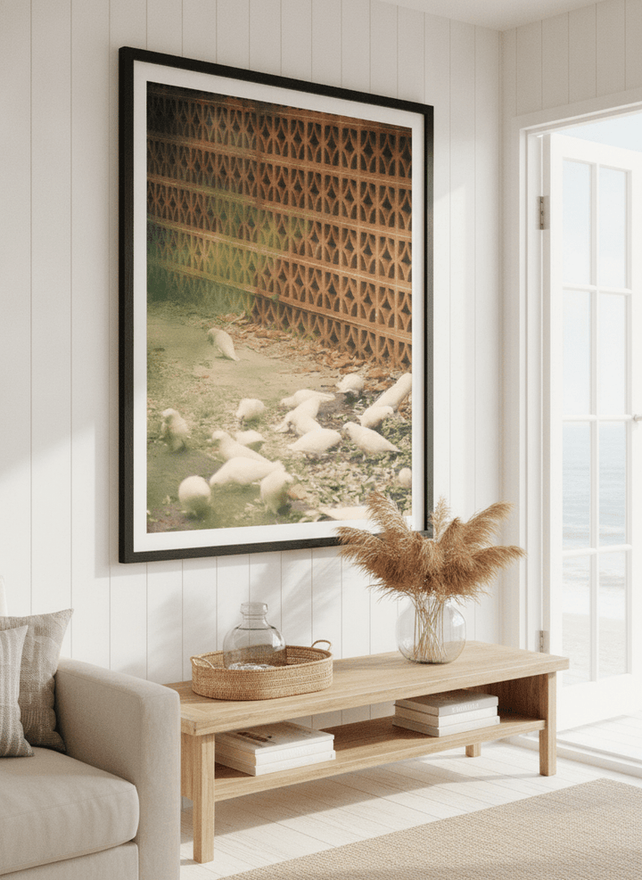 Neutral wall art displayed in a sunny coastal beach house
